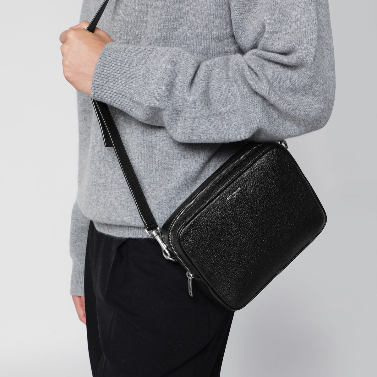 Small black camera bag in hammered leather