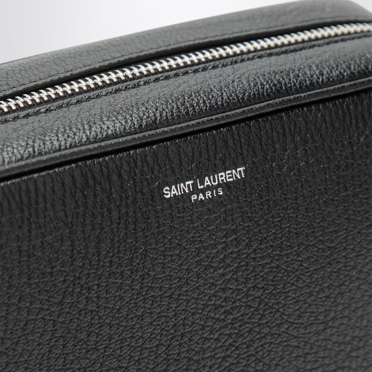 Small black camera bag in hammered leather
