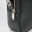 Small black camera bag in hammered leather