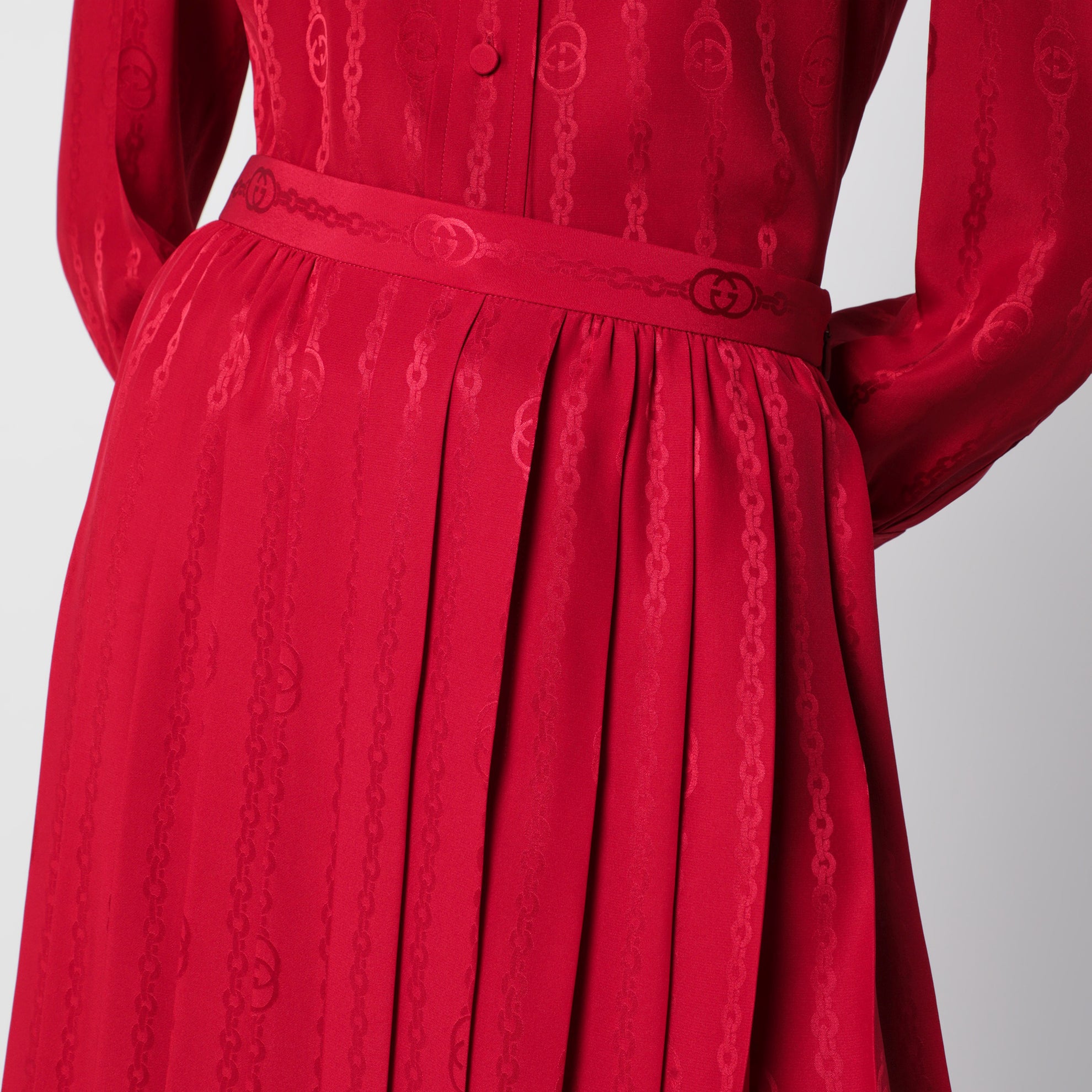 Gonna midi plissettata in seta jacquard rosso fuoco