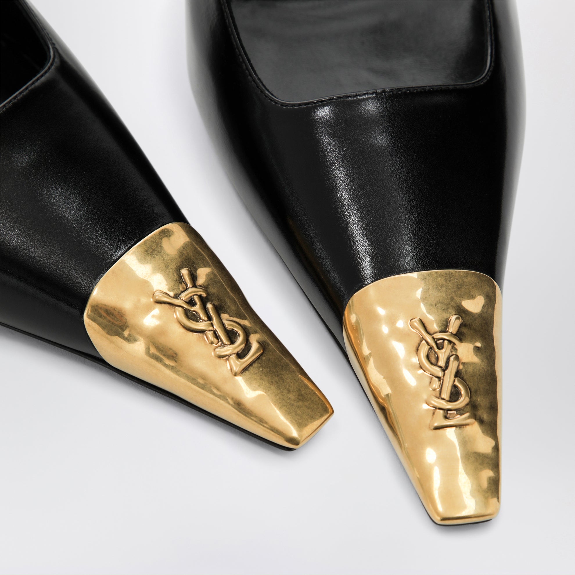 Jeanne slingback pumps in smooth black leather