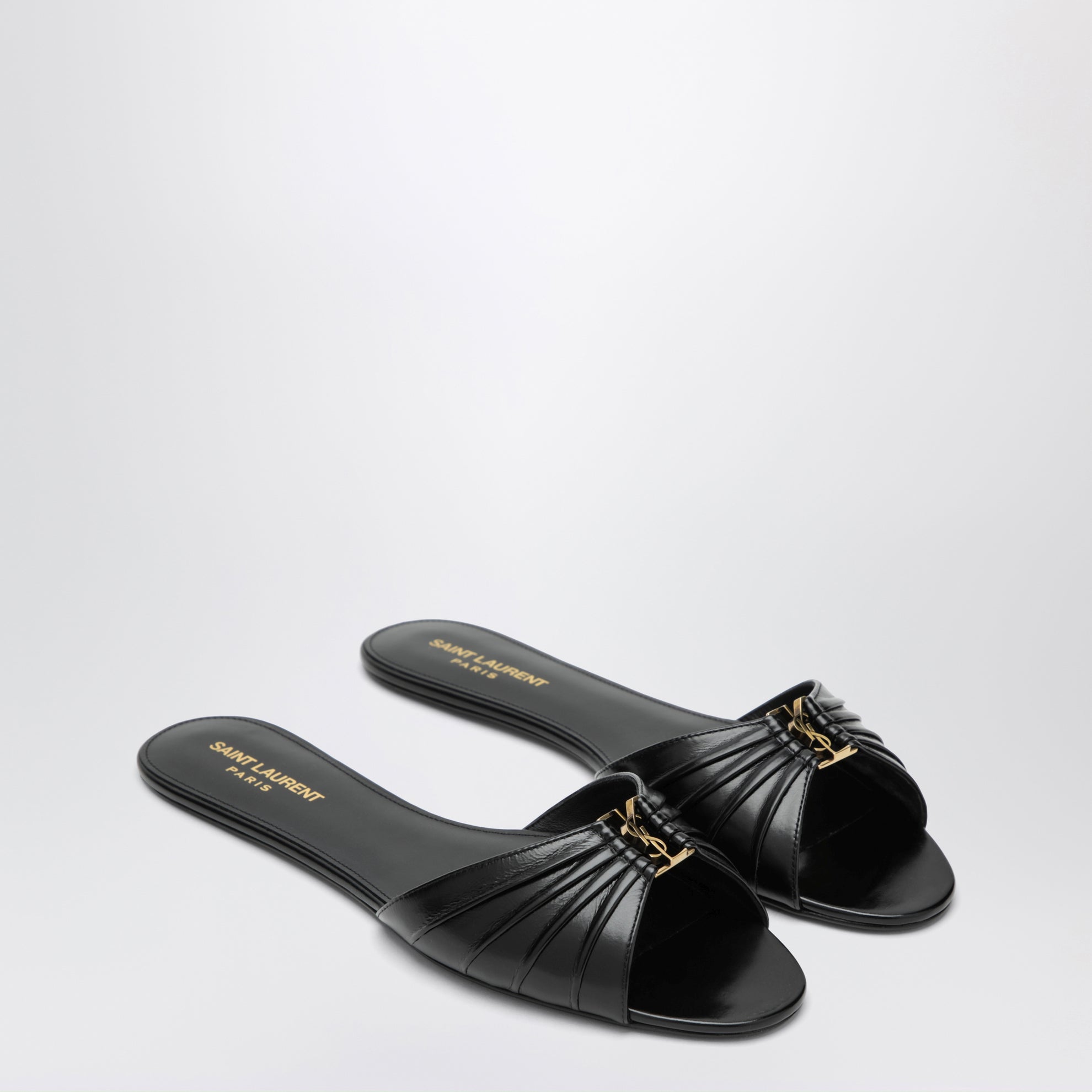 Babylone flat sandals in smooth black leather