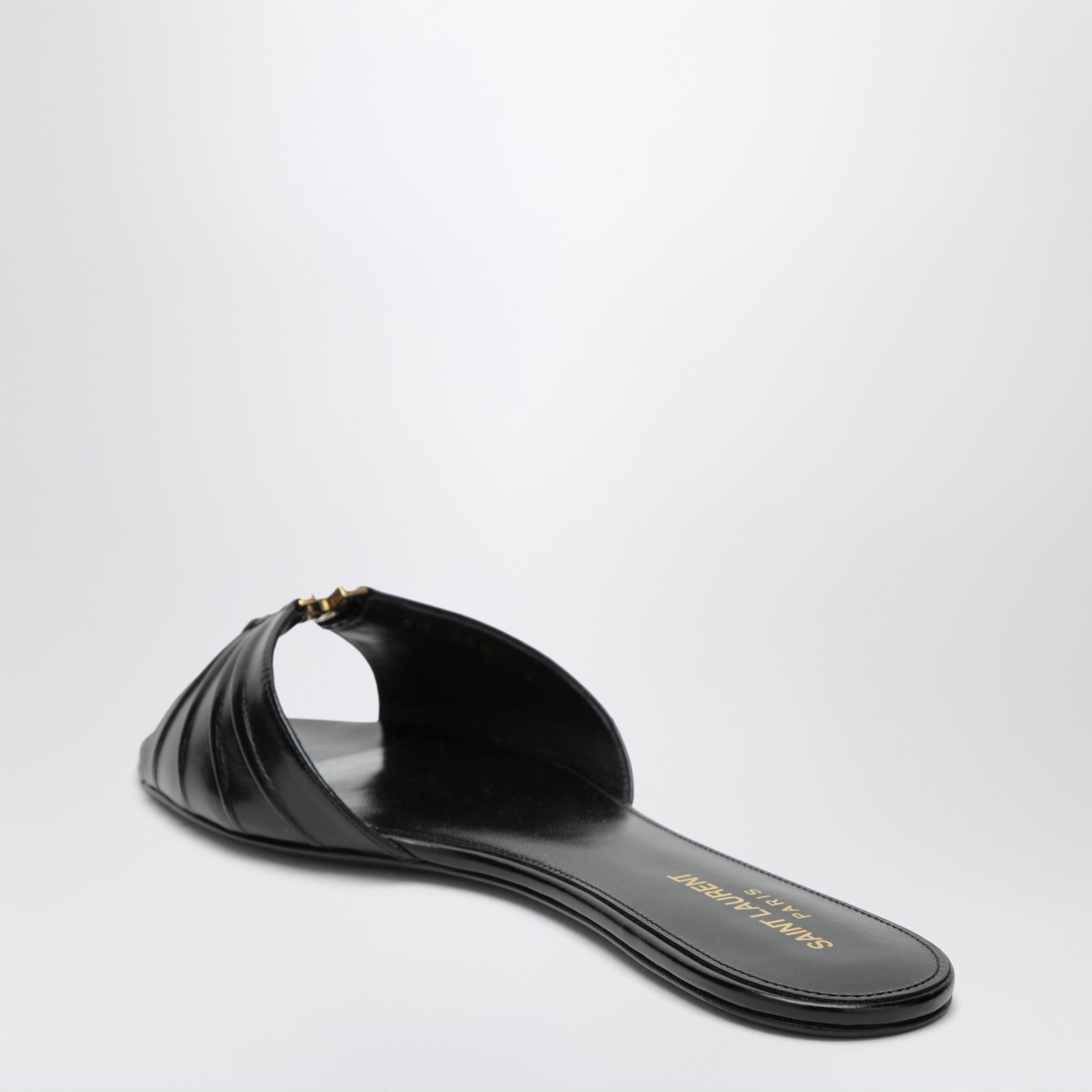 Babylone flat sandals in smooth black leather
