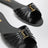 Babylone flat sandals in smooth black leather