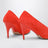 Duchesse 90 mm suede goatskin pumps in tangerine