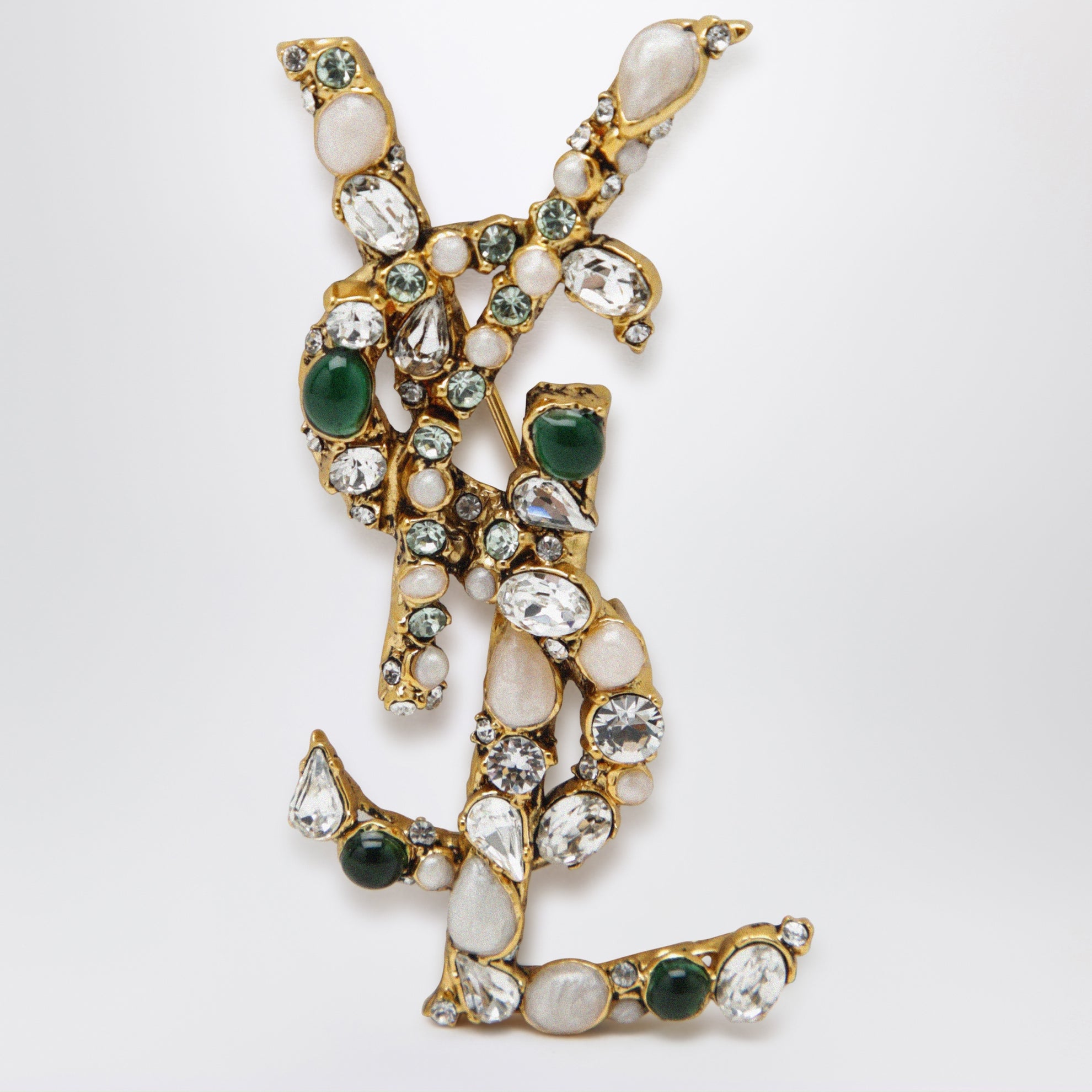 Spilla Cassandre con cristalli in ottone oro patinato