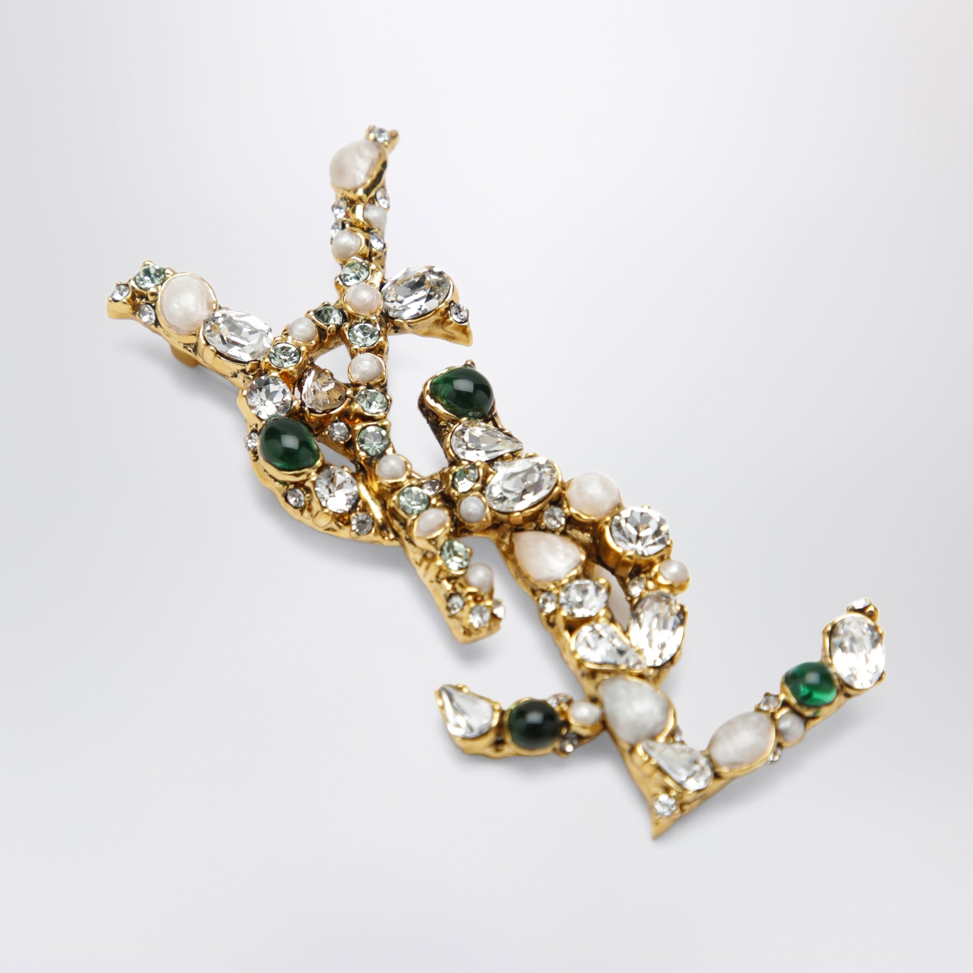 Spilla Cassandre con cristalli in ottone oro patinato