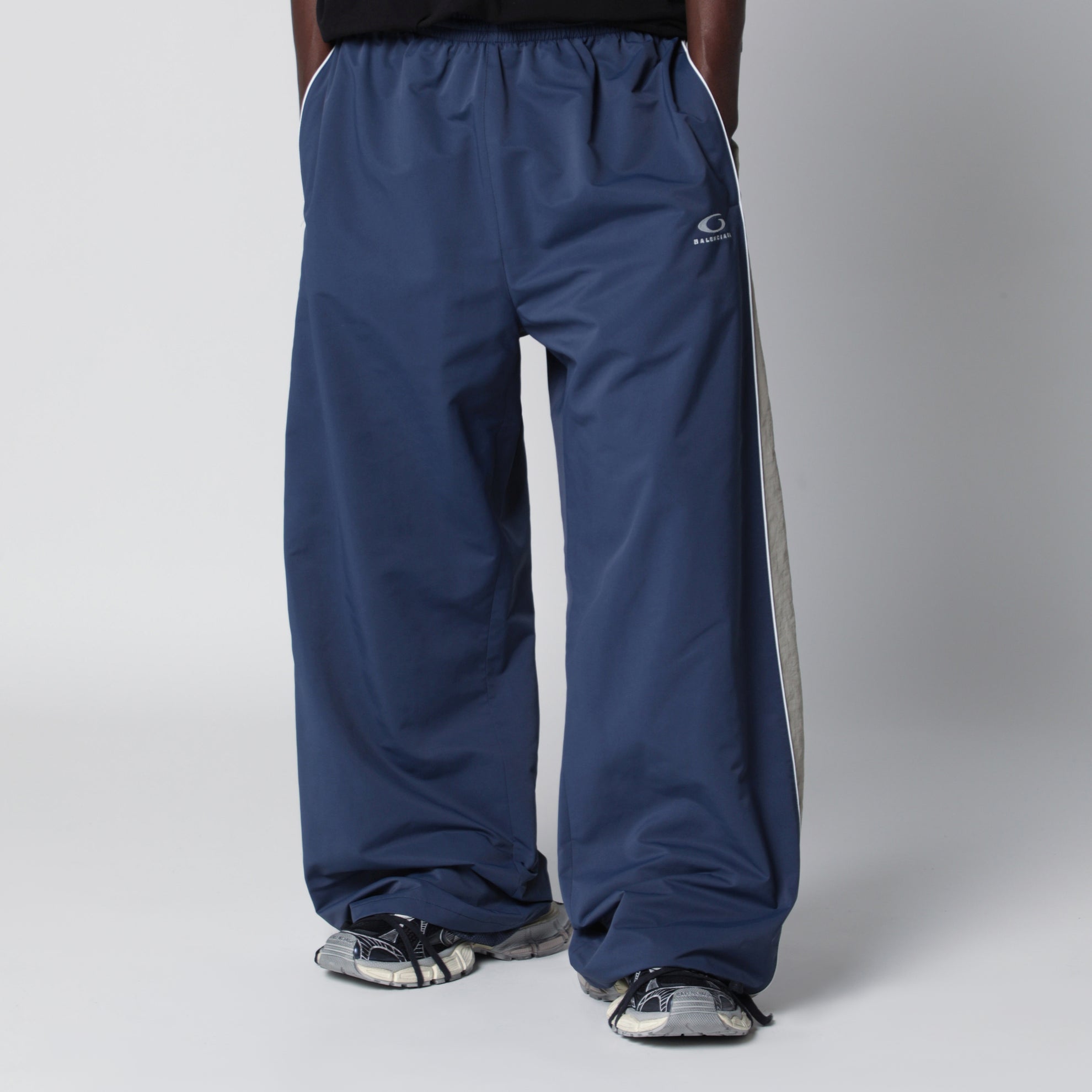 Washed technical satin track pants in marine blue