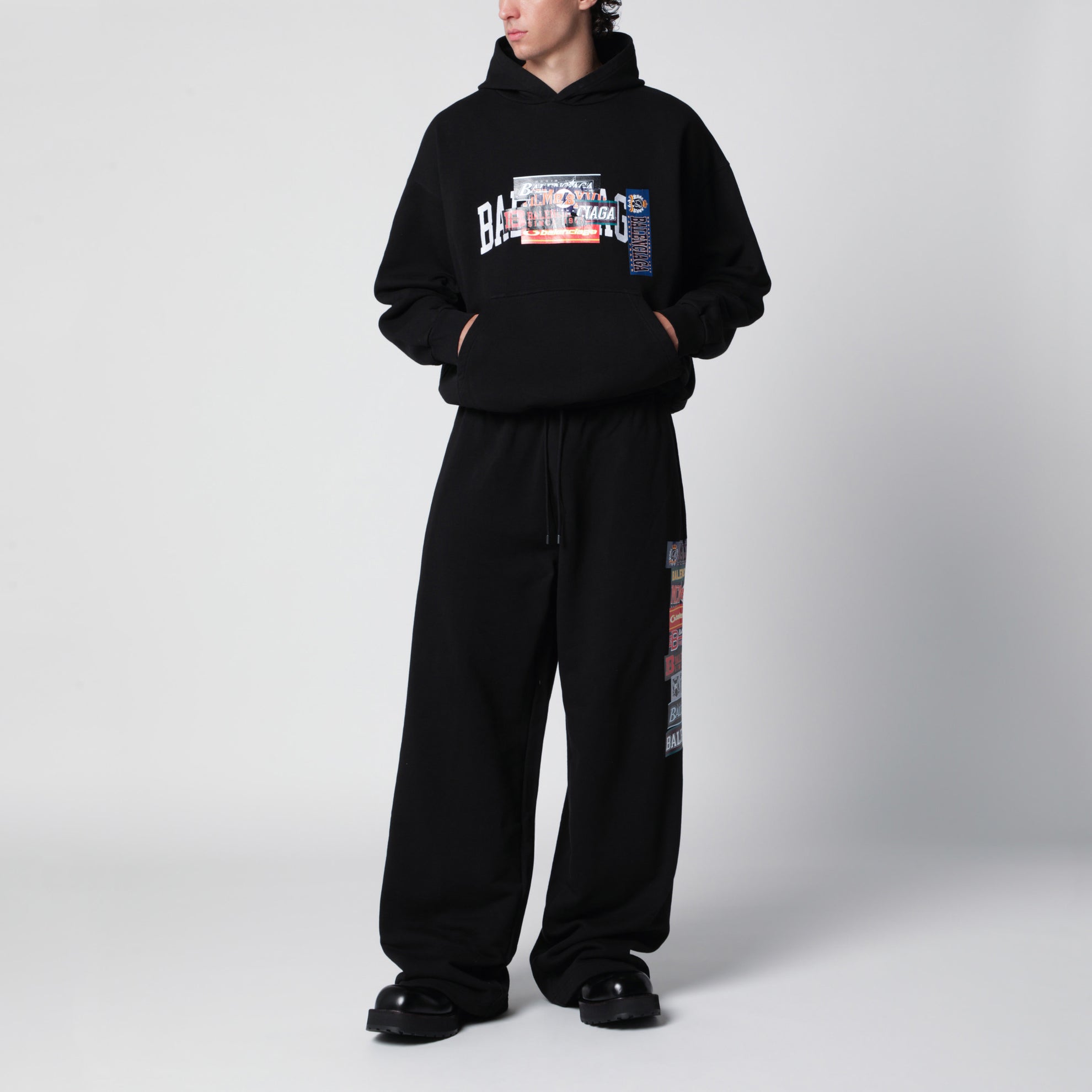 Black jogger trousers with logo print