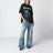 T-shirt over nera slavata con stampa logo