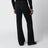Schwarze Stretch-Denimhose mit Used-Effekt