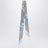 Bedrucktes Seidenband mit Flora-Motiv in Hellblau