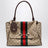 Borsa a mano Paparazzo media in tessuto GG marrone