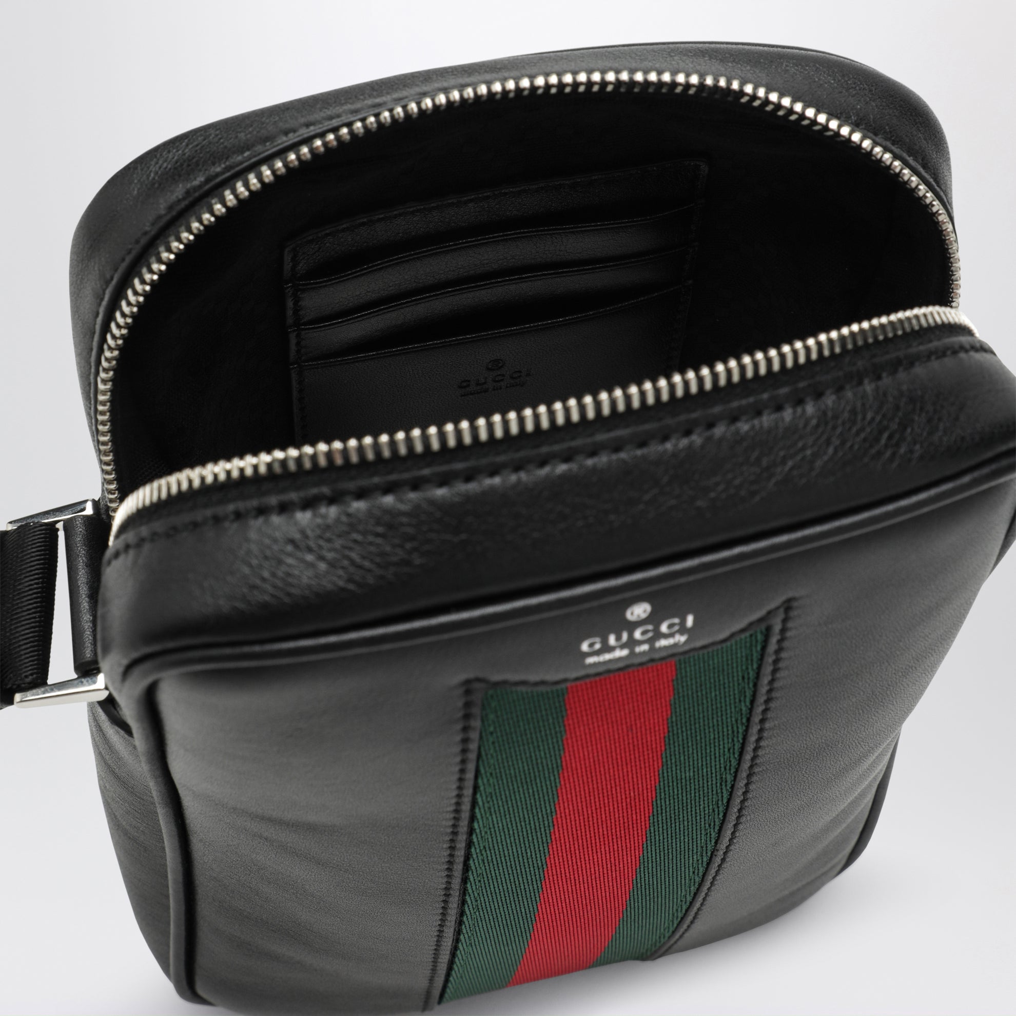 Tasche aus schwarzem Leder mit Web-Detail