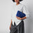 Andiamo Pouch aus Intrecciato-Veloursleder in Blue Royal