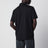 Black polo shirt with logo patch