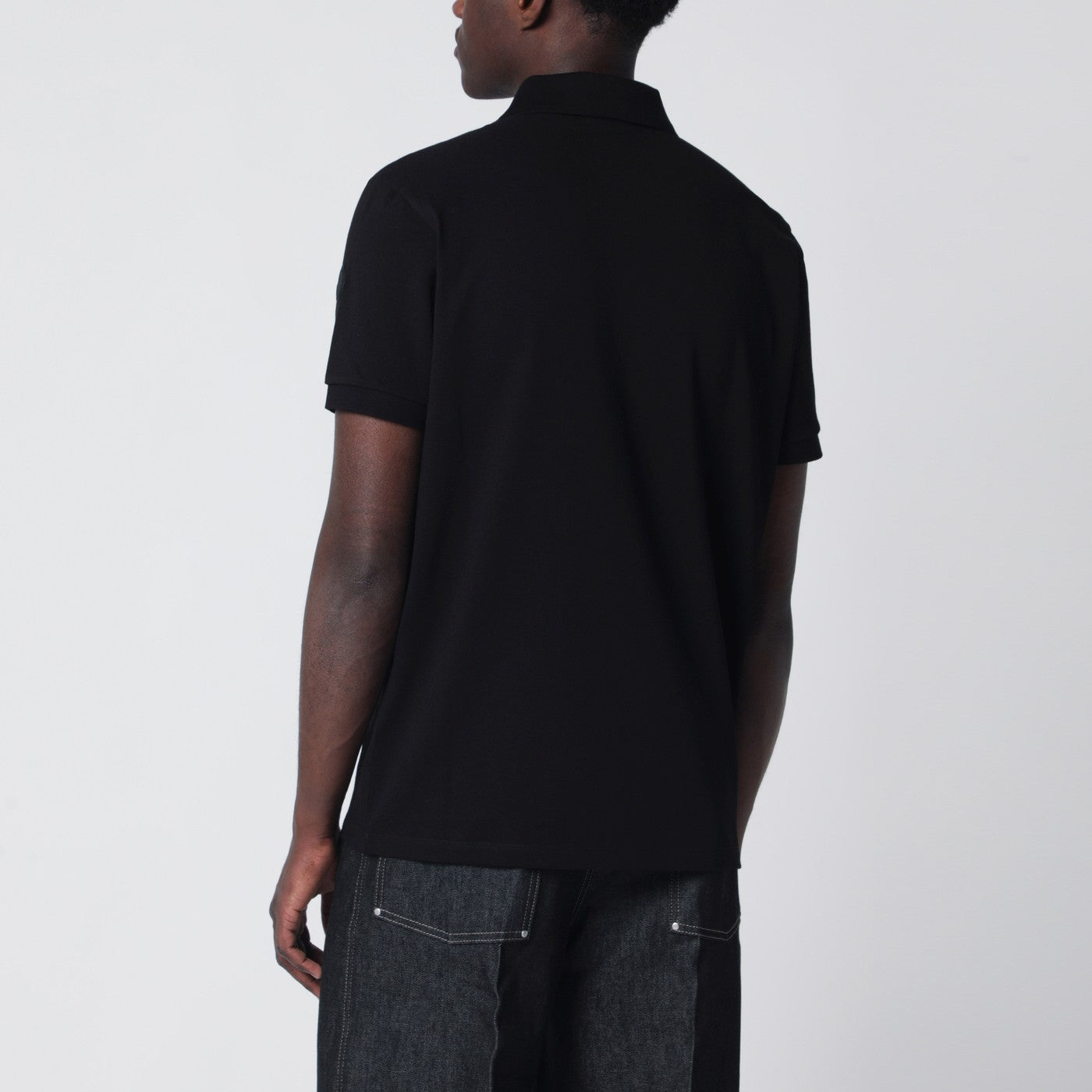 Black cotton piqué polo shirt with logo