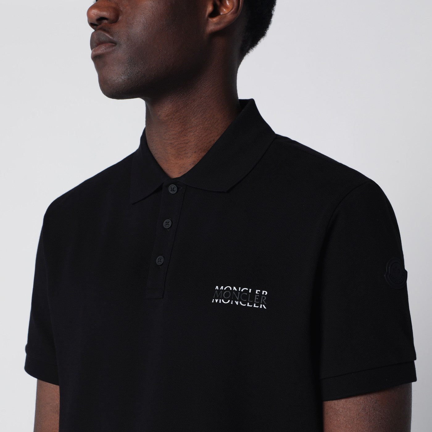 Black cotton piqué polo shirt with logo