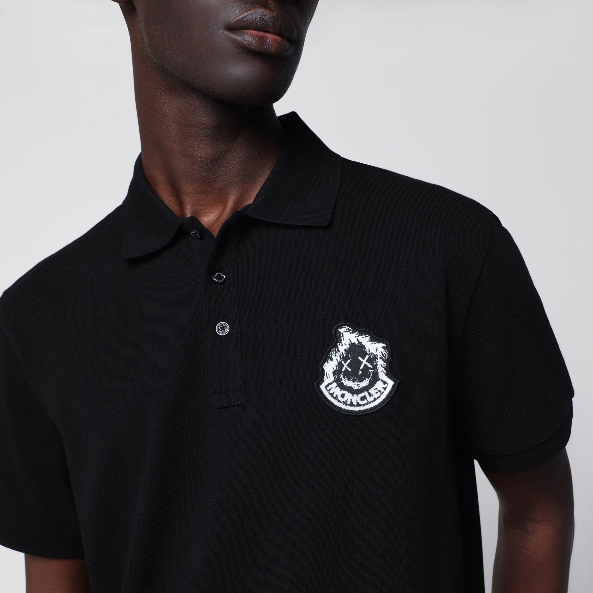 Black cotton piqué polo shirt with logo