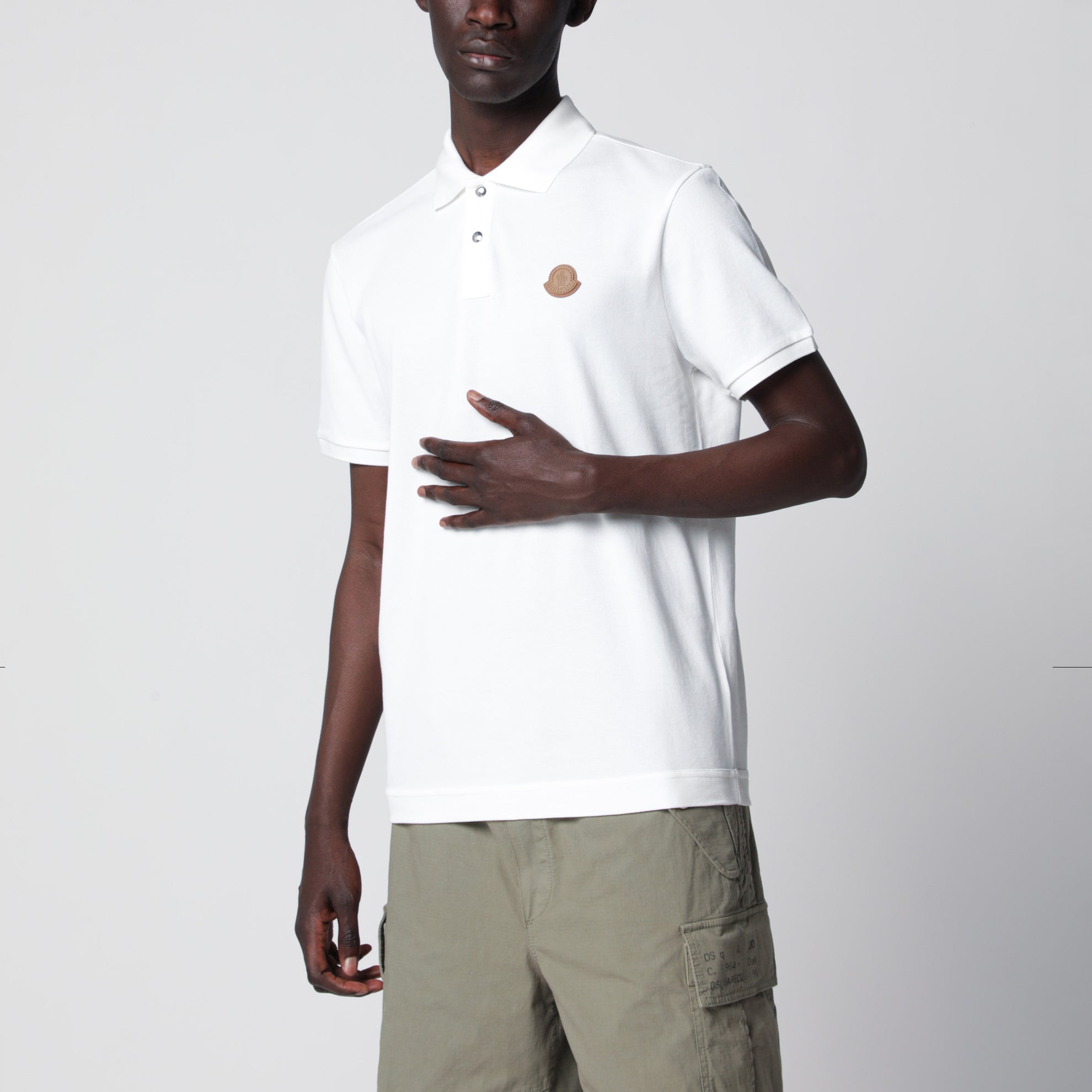 Polo in piquet di cotone bianca con patch logo