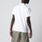 Polo in piquet di cotone bianca con patch logo