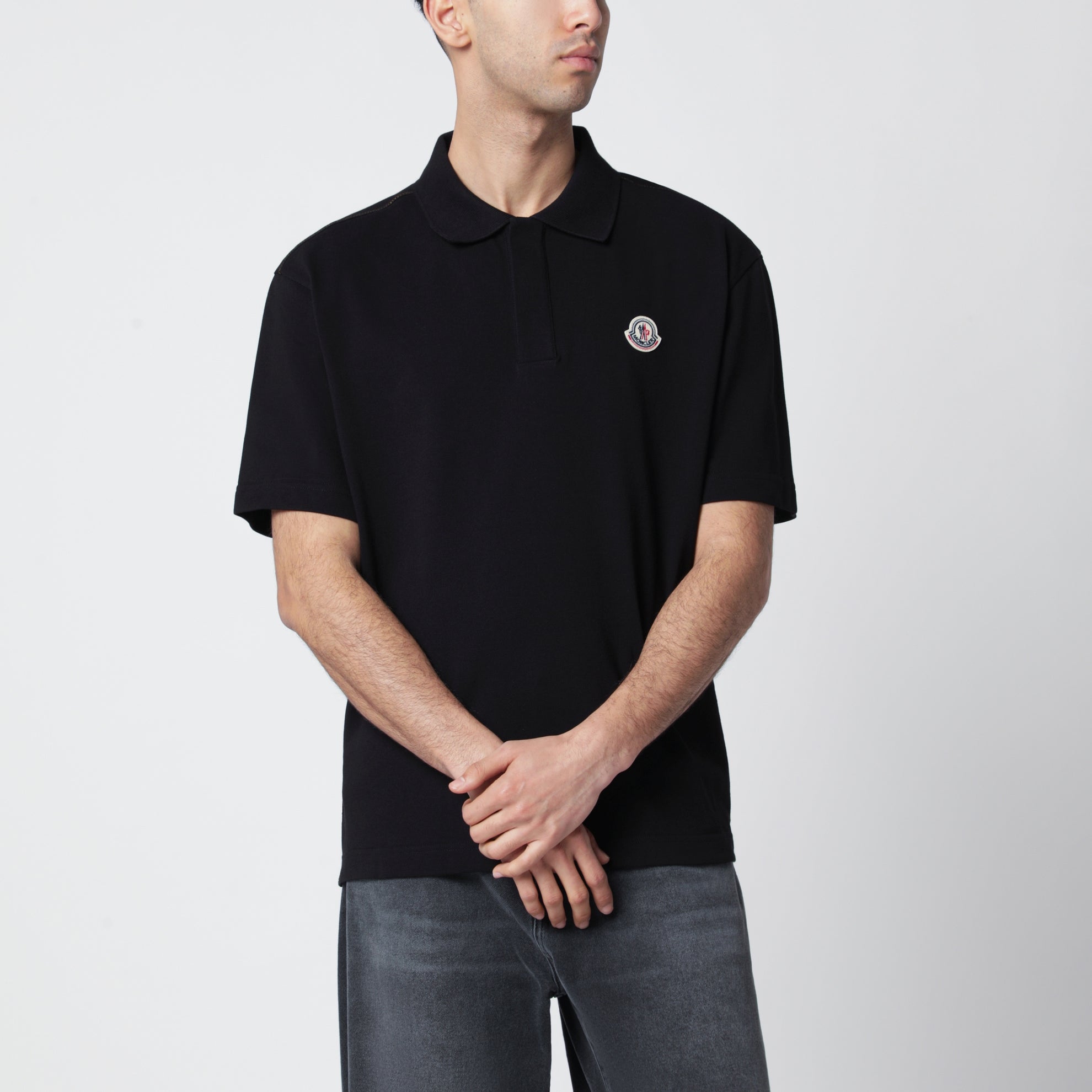 Black cotton piqué polo shirt with logo
