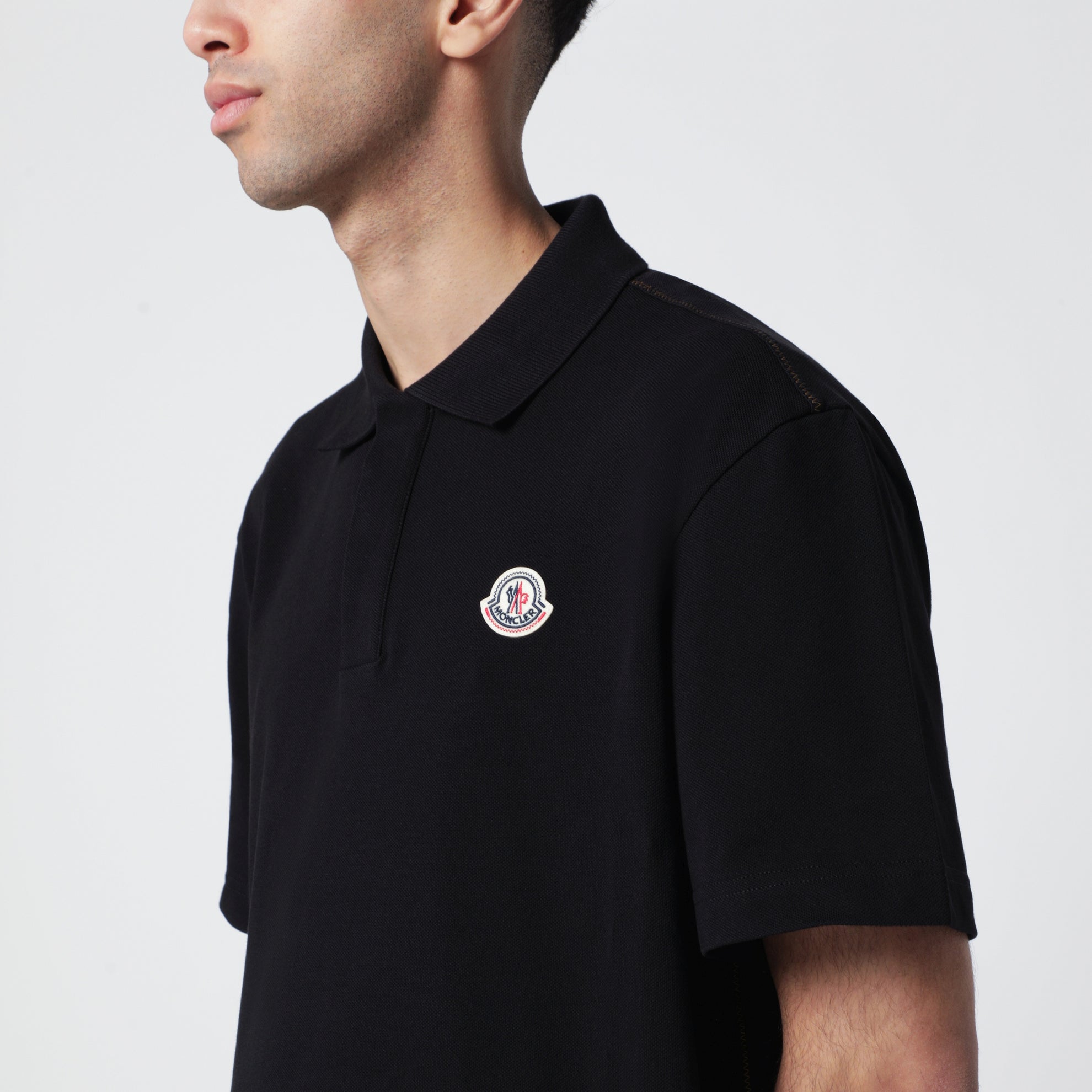 Black cotton piqué polo shirt with logo