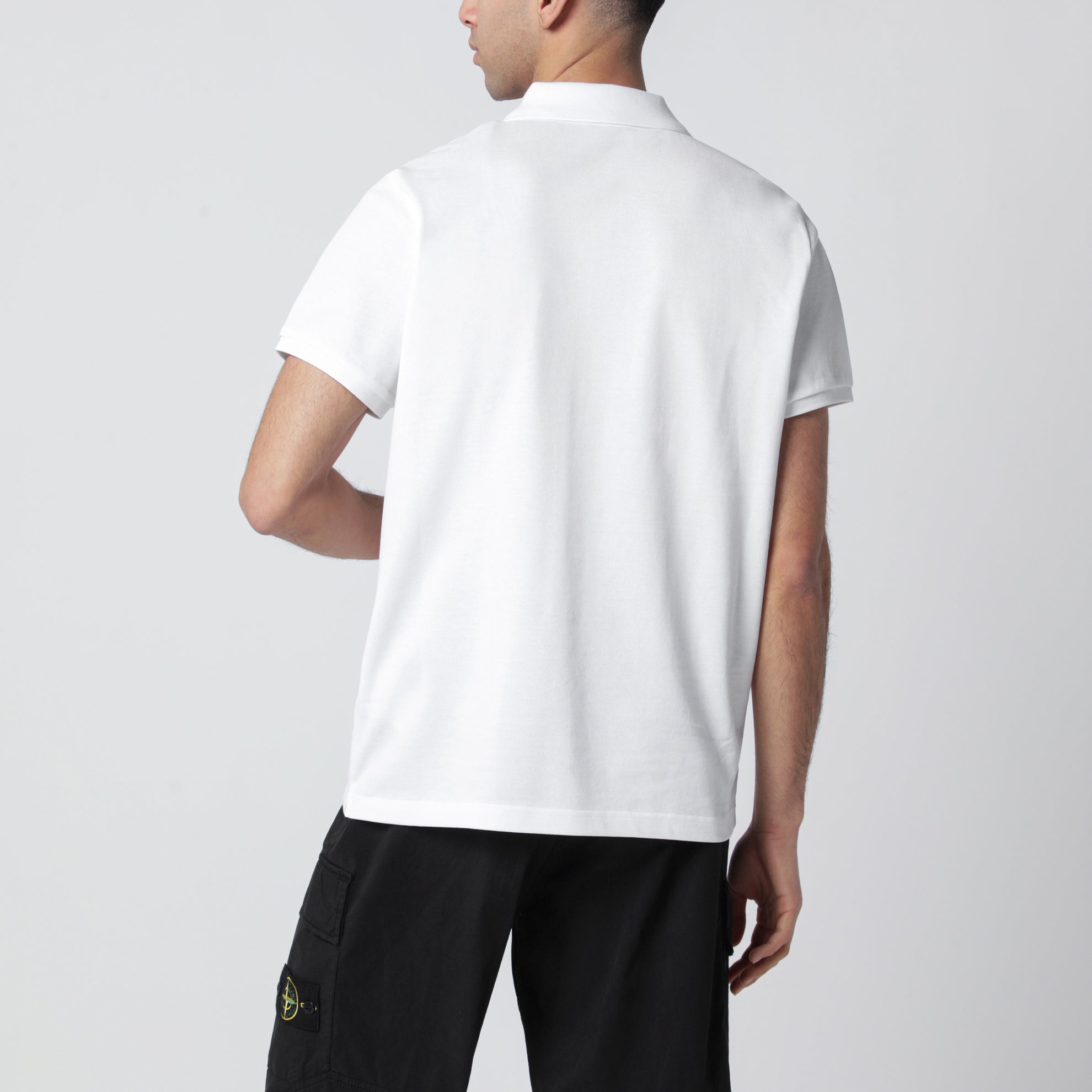 Polo in cotone bianca con patch logato