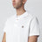 Polo in cotone bianca con patch logato
