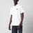 Polo bianca in cotone con patch tre stemmi logo