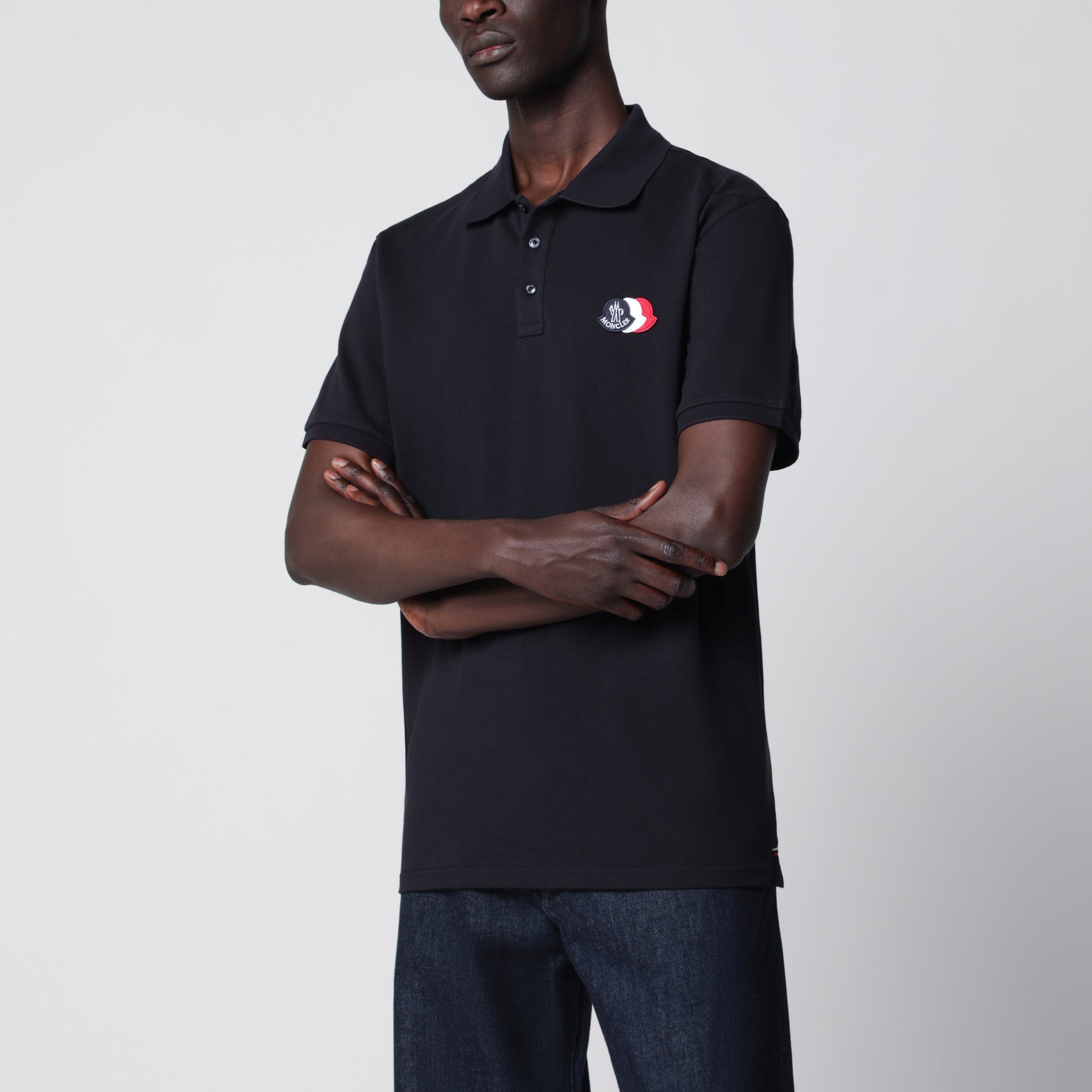 Polo bleu en coton avec patch logo triple blason