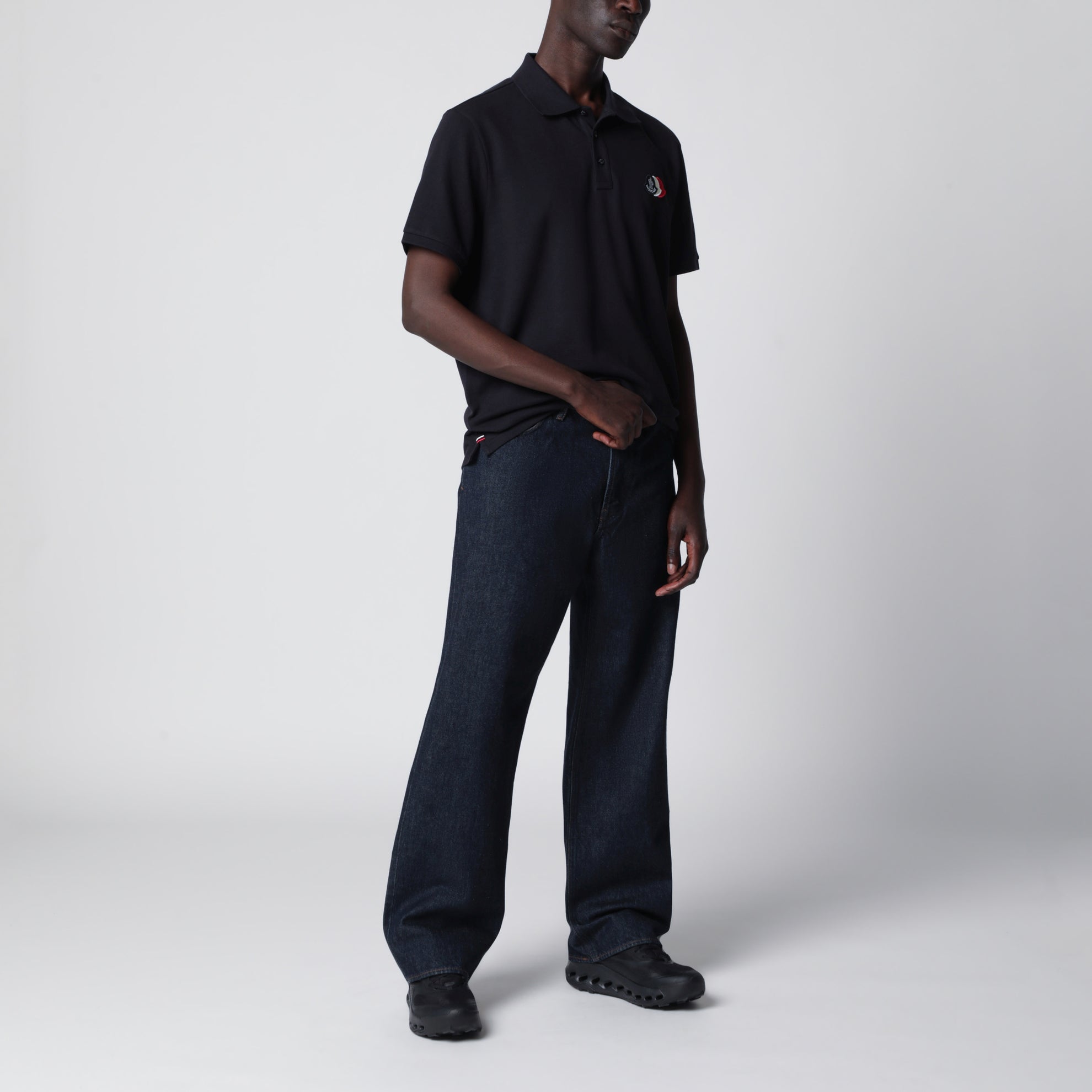 Polo bleu en coton avec patch logo triple blason