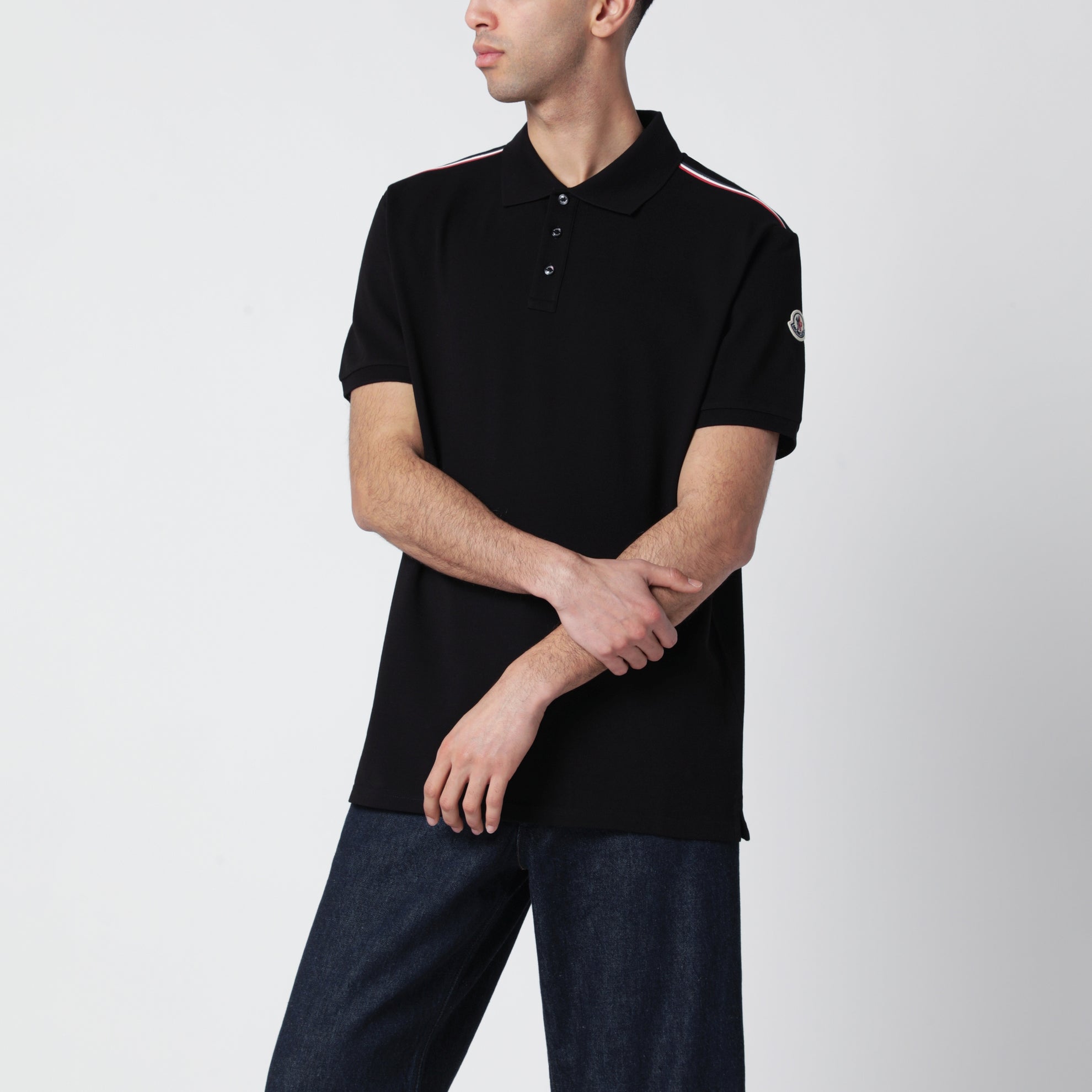 Polo in piqué di cotone nera con bordi tricolori