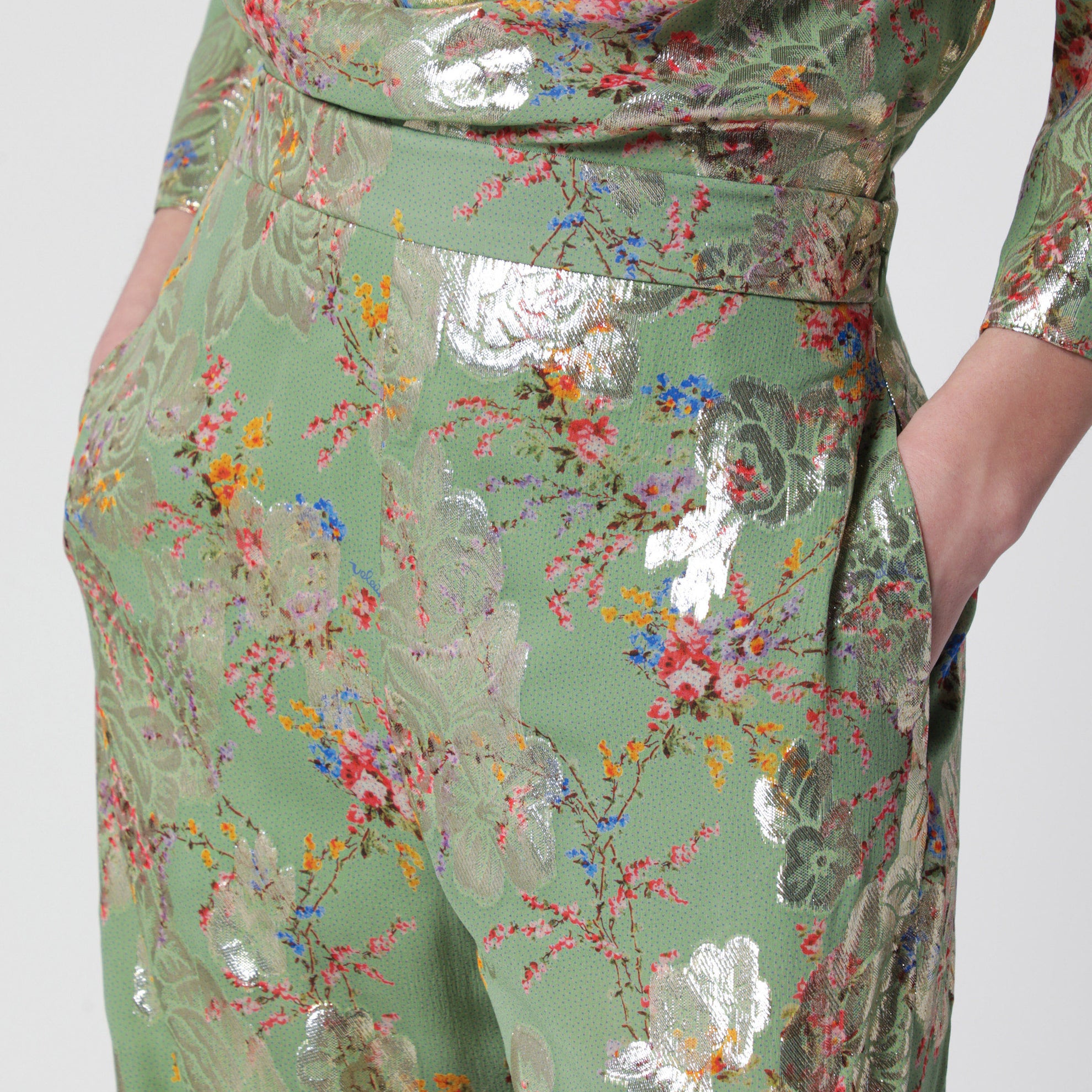 Silk trousers with all-over print in green
