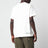 T-shirt avorio in cotone con logo e coordinate