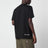 T-shirt nera in cotone con logo