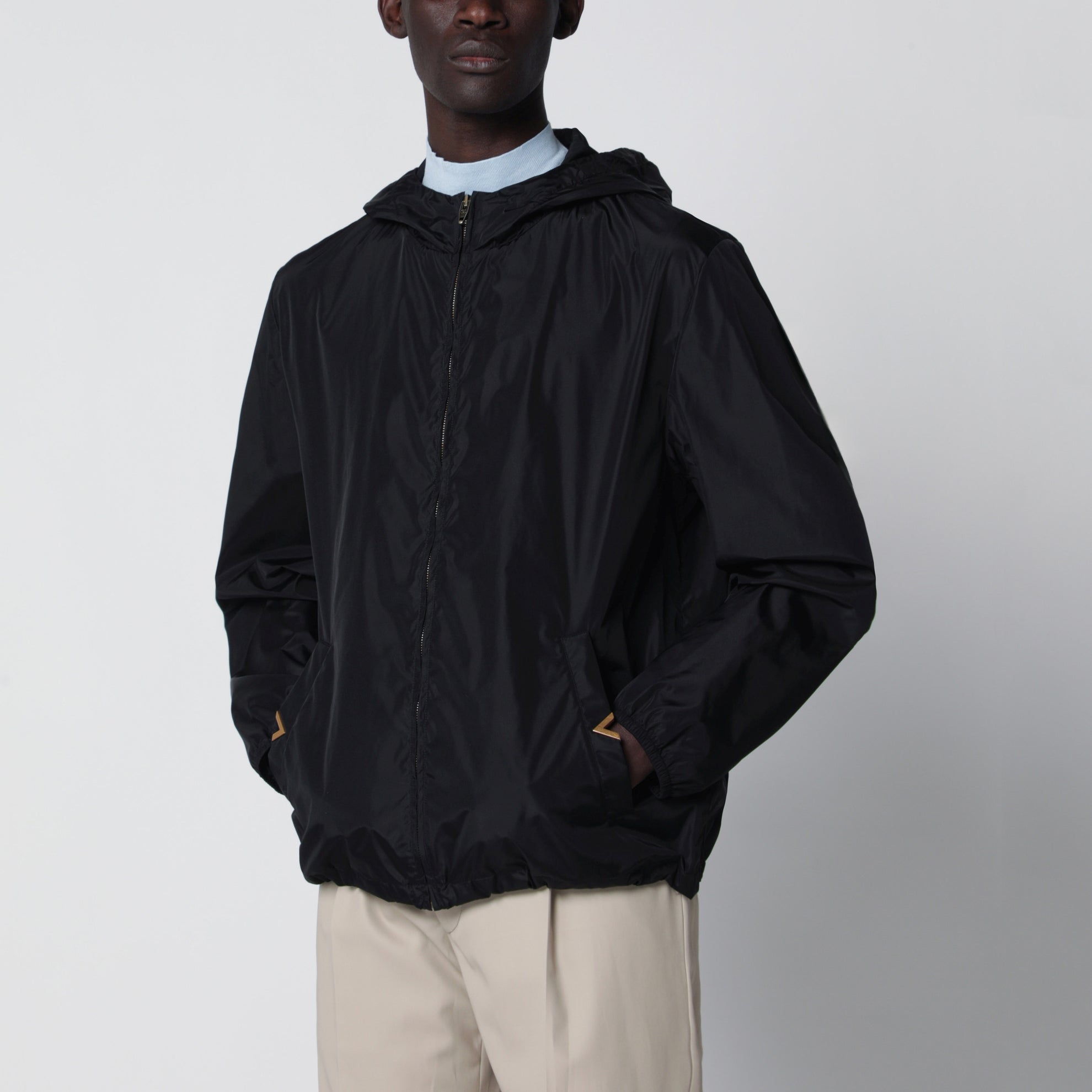 Black windbreaker with Vgold detail