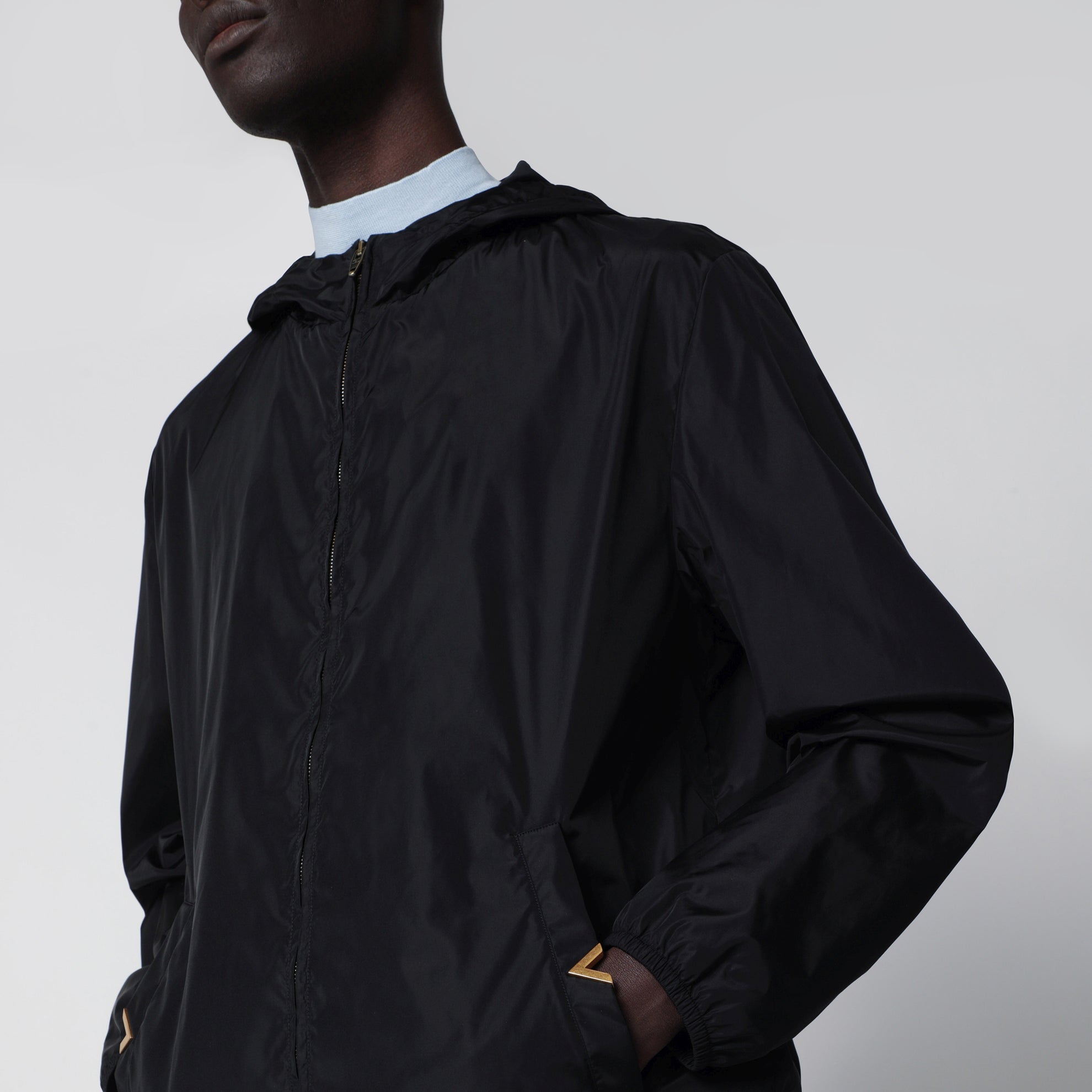 Black windbreaker with Vgold detail