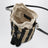 Kleine Bucket-Bag aus Raffia mit beige- und schwarzen Streifen