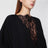 Black sweatshirt-style mini dress with lace inserts