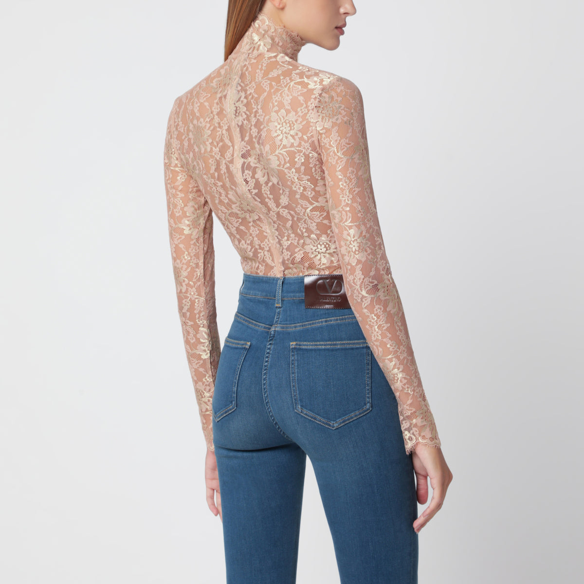 Nude semi-sheer floral lace bodysuit
