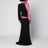 Robe longue noire en soie avec drapé rose