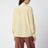 Hellbeige Seidenbluse mit Schleife