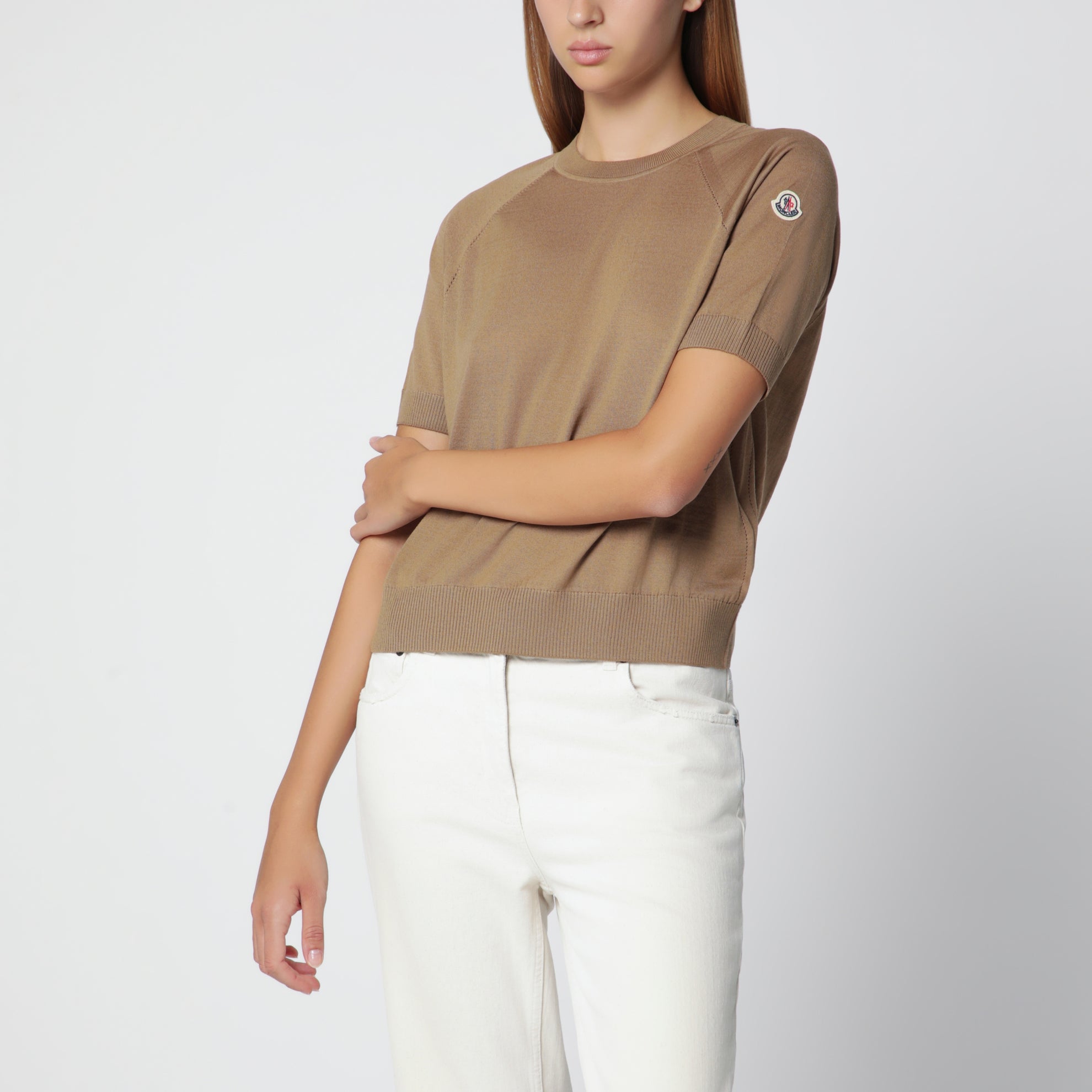Beige wool sweater with logo patch