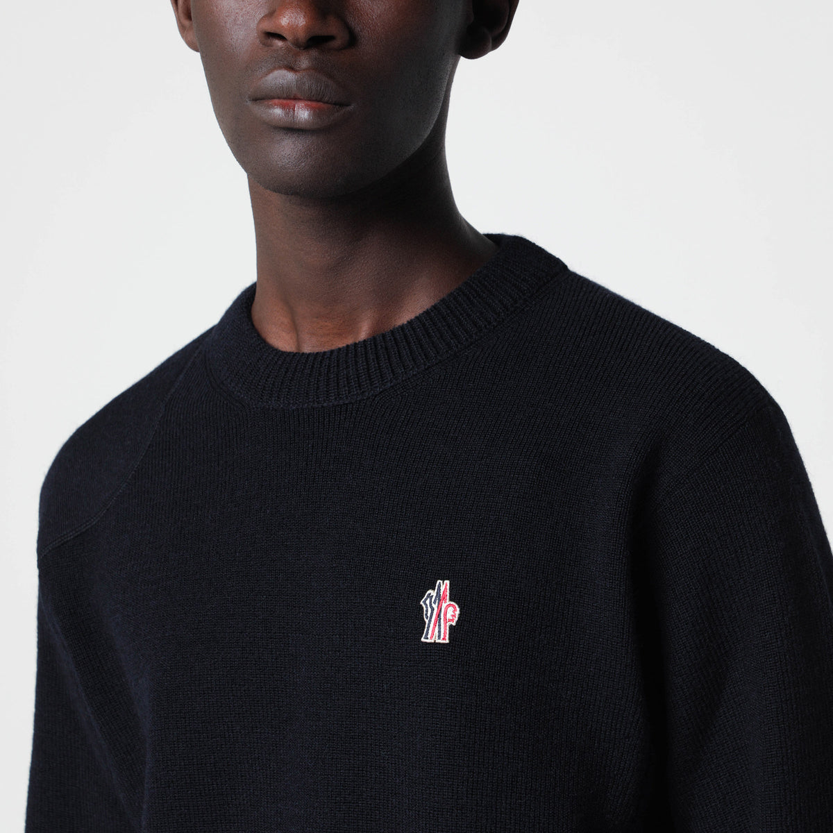 Blauer Pullover aus Wolle mit Logo-Patch