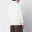 Cremefarbener gerippter Wollpullover