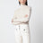 Pull col roulé beige clair en laine