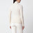 Maglia dolcevita beige chiara in lana