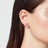 Goldfarbene VLogo Signature Ohrringe mit Schleife