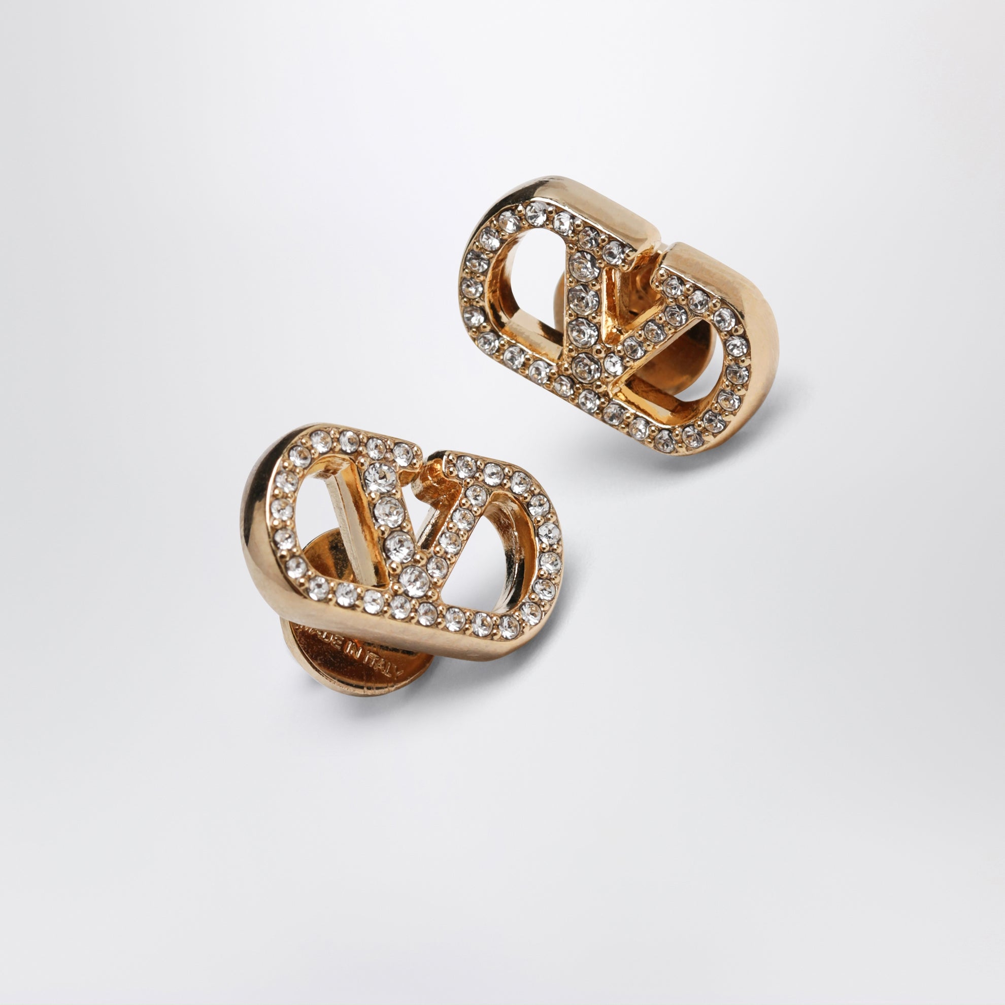 Boucles d’oreilles VLogo Signature dorées avec cristaux